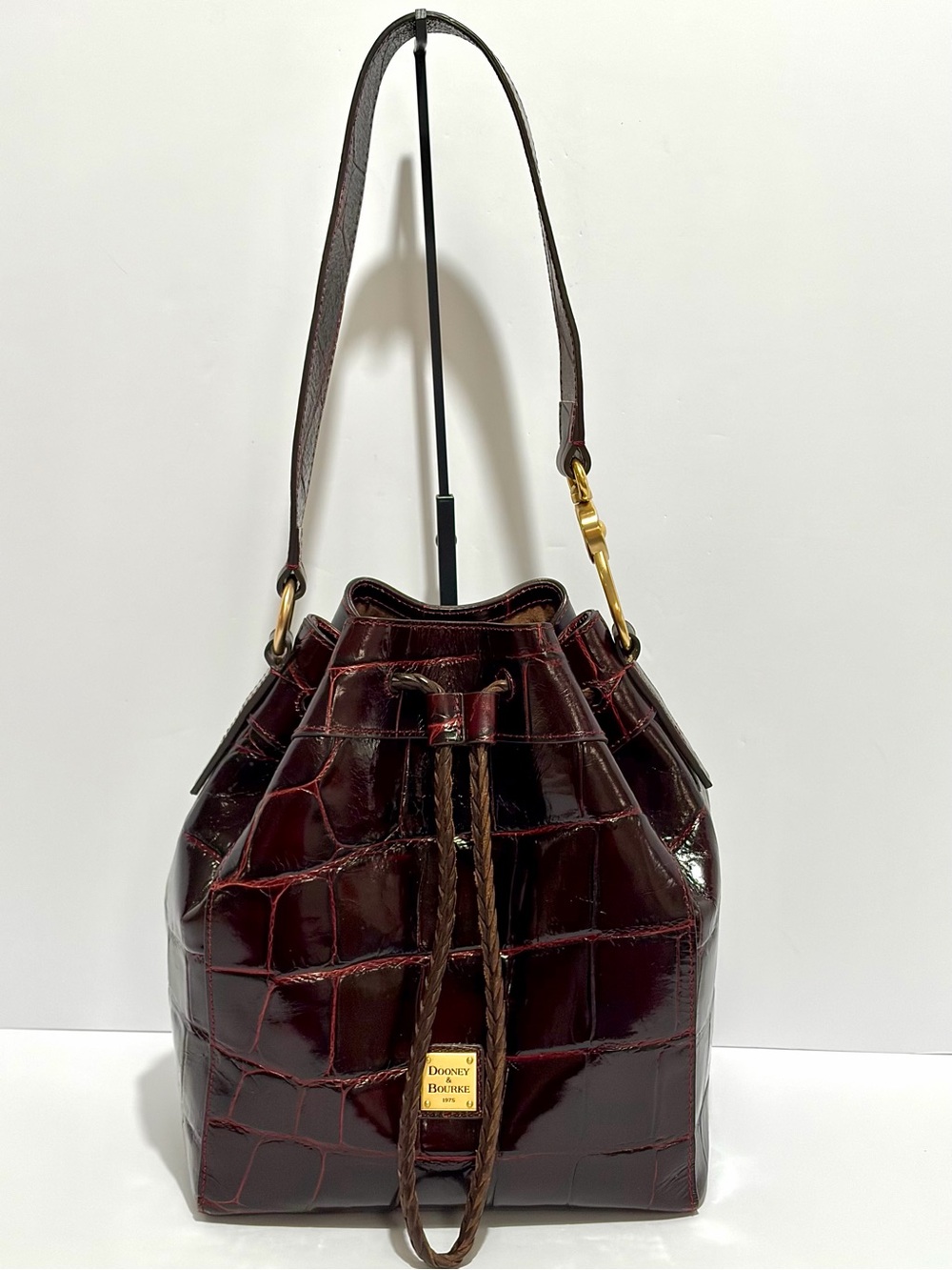 Dooney & Bourke Denison Drawstring Bag In Crocodile Embossed Bordeaux Leather